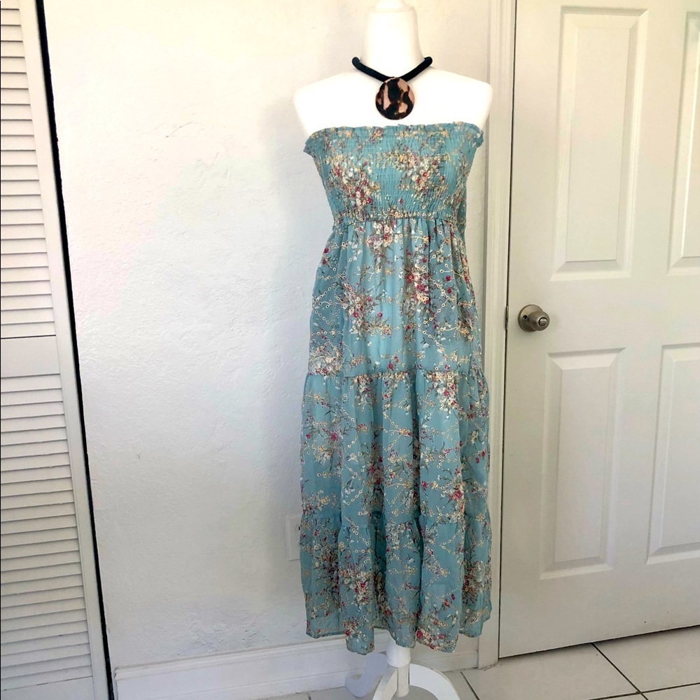 A boho pastel green floral dress